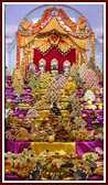 Annakut before Bhagwan Swaminarayan, Aksharbrahman Gunatitanand Swami and Shri Gopalanand Swami