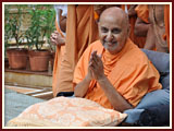  Swamishri on his way for his morning puja