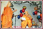 Balika Din Morning Programs June 09, 2004 - Swamishri dances with joy as Pujya Ghanshyamcharan Swami sings