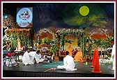 Swamishri guides a blind-folded balak through an obstacle course