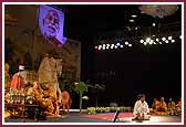 Evening ,Swamishri guides a remote-controlled blimp 