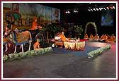 Morning,Saints sing kirtans while Swamishri performs pooja