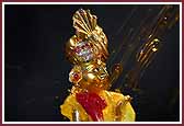Evening ,Swamishri sprays Shri Harikrishna Maharaj with colored water 