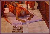 Swamishri performs sashtang dandvat pranam on the auspicious day of Dev Shayani Ekadashi 