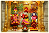  The images of Harikrishna Maharaj and Radha Krishna Dev adorned with flowers