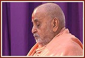 Reading the Shikshapatri in his puja