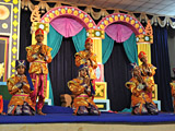 Kids perform a cultural dance