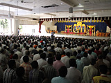Devotees engaged in darshan of Swamishri
