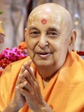  Swamishri in a divine mood bidding Jai Swaminarayan to devotees