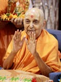 Swamishri in a divine mood blessing the devotees