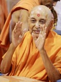 Swamishri in a divine mood blessing the devotees