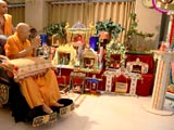 Swamishri engaged in darshan of hindolas made by kishores and kishoris