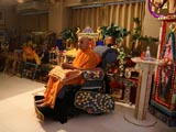 Swamishri engaged in darshan of hindolas made by kishores and kishoris