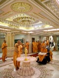 Swamishri engaged in abhishek darshan of Shri Nilkanth Varni 