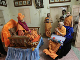  Swamishri engaged in darshan of Shastriji Maharaj