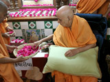Swamishri sanctifies bricks for the new mandir at Kanthariya
