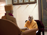 Swamishri engaged in darshan of Brahmaswarup Yogiji Maharaj