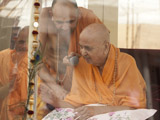 Swamishri blesses an old devotee