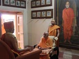  Swamishri engaged in darshan of Brahmaswarup Yogiji Maharaj
