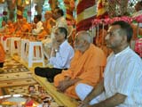  Sadhus and devotees engaged in patotsav mahapuja rituals