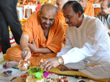  Sadhus and devotees engaged in patotsav mahapuja rituals