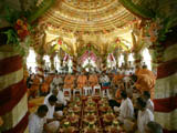  Sadhus and devotees engaged in patotsav mahapuja rituals