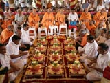  Sadhus and devotees engaged in patotsav mahapuja rituals