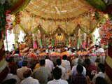  Sadhus and devotees beneath the mandir dome