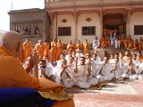  Sadhus and parshads engaged in Swamishri's darshan