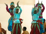 Kids perform a dance before Swamishri