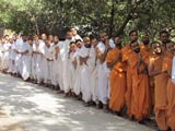  Sadhus and parshads engaged in Swamishri's darshan