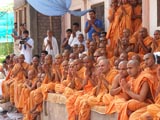  Sadhus and parshads engaged in Swamishri's darshan