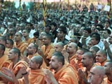  Sadhus and devotees engaged in Swamishri's darshan