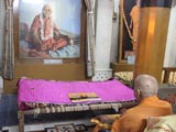 Swamishri engaged in darshan of Brahmaswarup Shastriji Maharaj at Rang Mandap