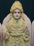  Shri Ghanshyam Maharaj adorned in flowers