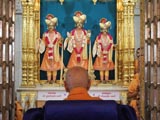  Swamishri engaged in darshan of Thakorji