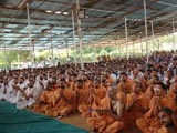  Sadhus and devotees engaged in Swamishri's darshan