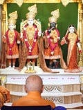  Swamishri engaged in darshan of Thakorji