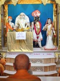 Swamishri engaged in darshan of Thakorji