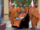  Swamishri and senior sadhus observe the adhiveshan panels
