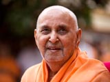 Swamishri in a divine, jovial mood