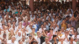  Devotees joyfully doing darshan of Swamishri