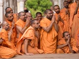 Sadhus engrossed in Swamishri's Darshan 