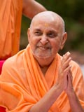 Swamishri in a divine, jovial mood