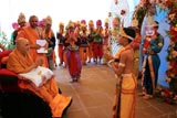 Swamishri is welcomed by children dressed as dev-balaks