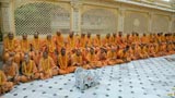 Sadhus waiting for Swamishri's darshan in the mandir pradakshina