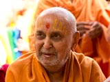 Swamishri in a divine, jovial mood