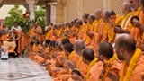 Sadhus sing kirtans and play musical instruments while doing darshan of Shri Harikrishna Maharaj and Swamishri