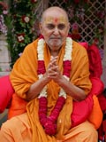 Swamishri in a divine, jovial mood
