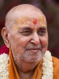 Swamishri in a divine, jovial mood